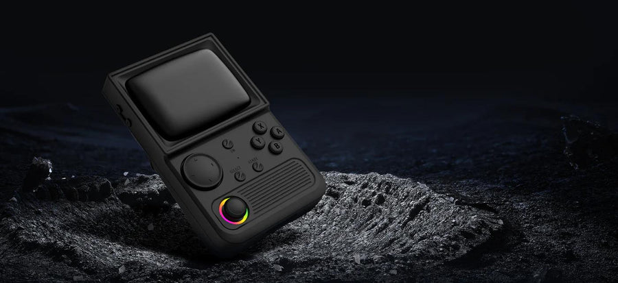 Black R36T retro gaming handheld console displayed on a dark rocky surface with a glowing RGB joystick in a dramatic hero banner.
