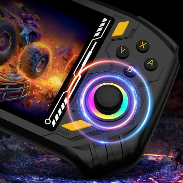 Close-up of a black RG52 MINI retro gaming handheld console with an illuminated RGB joystick, colorful action buttons, and a monster truck game on the screen.